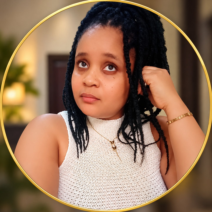 Gochi Bridget, founder of Soul Tribe, looking up thoughtfully.